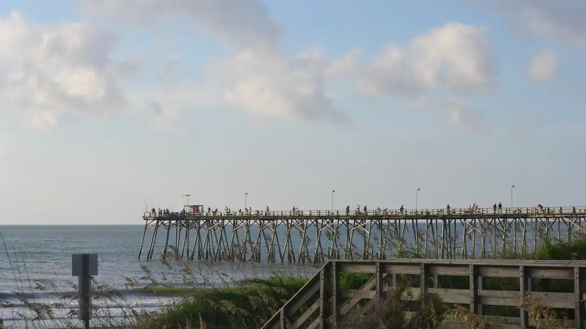 Kure Beach Fishing Pier seen from the dunes