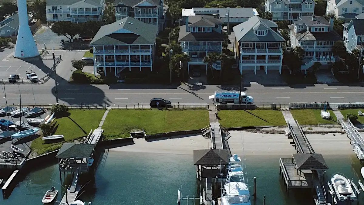 Wrightsville Beach from above: the water tower, the beach houses, the ocean, and the Fuel Wave tanker on the road beside the docks